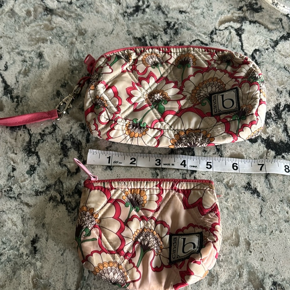 Pair of women’s coin purse and wristlet